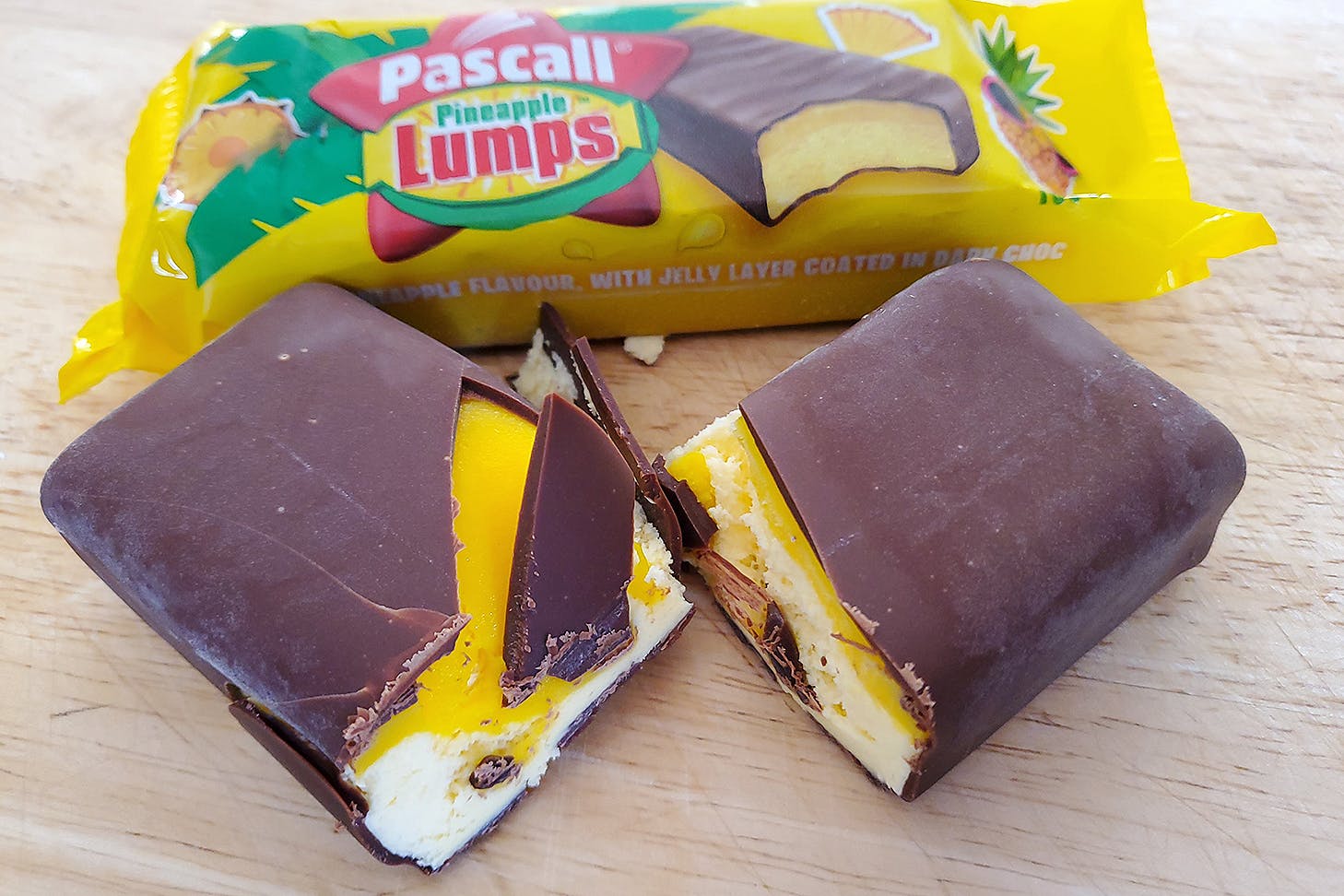 A pineapple lump ice cream bar cracked open for your viewing pleasure.